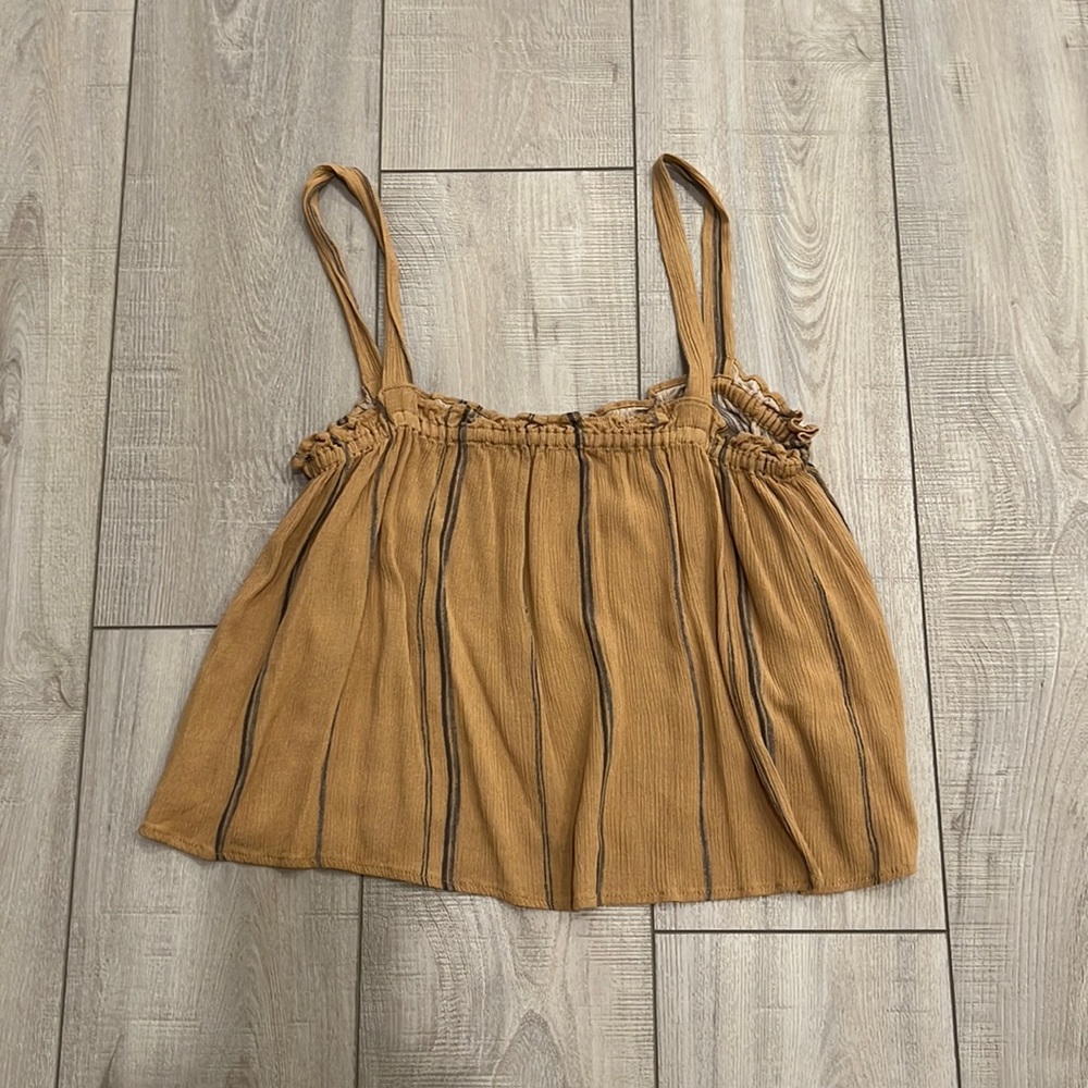 Flowy Top. Crop top depending on your height. Brand new.